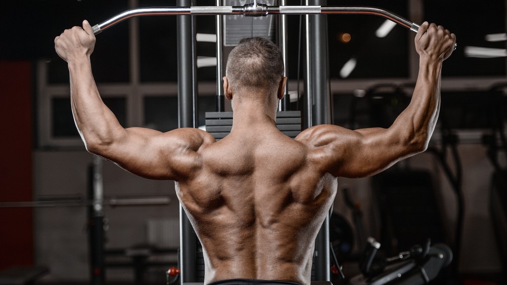 Conas an Lat Pulldown agus Meaisín Rae Íseal a Úsáid