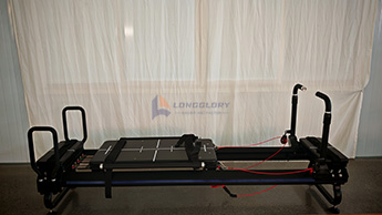 Athchóiritheoir alúmanaim ilfheidhmeach Pilates